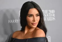 Kim Kardashian imitates Barbiecore in recent photos wearing a pink bikini