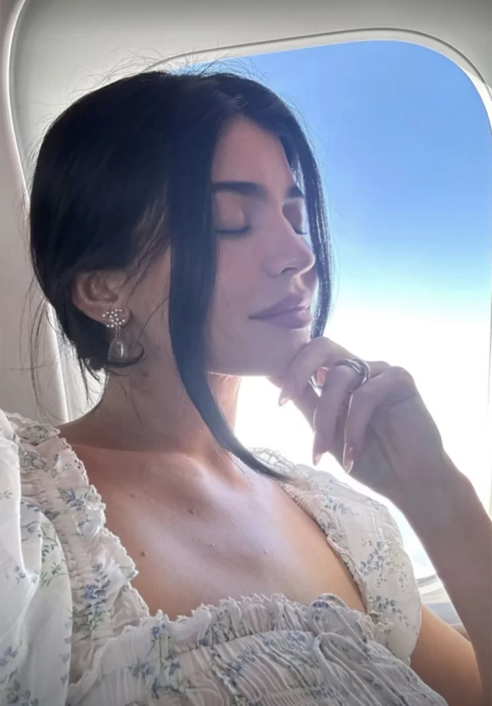 Kylie Jenner wears a gold trinity ring on her wedding finger
